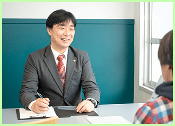 お客さまとご相談する様子